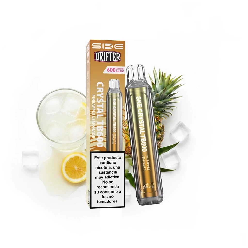 Vaper SKE Crystal TB600 Pineapple Lemonade dorado junto a su caja, con piña, limón, un vaso con hielo y advertencia sobre nicotina.