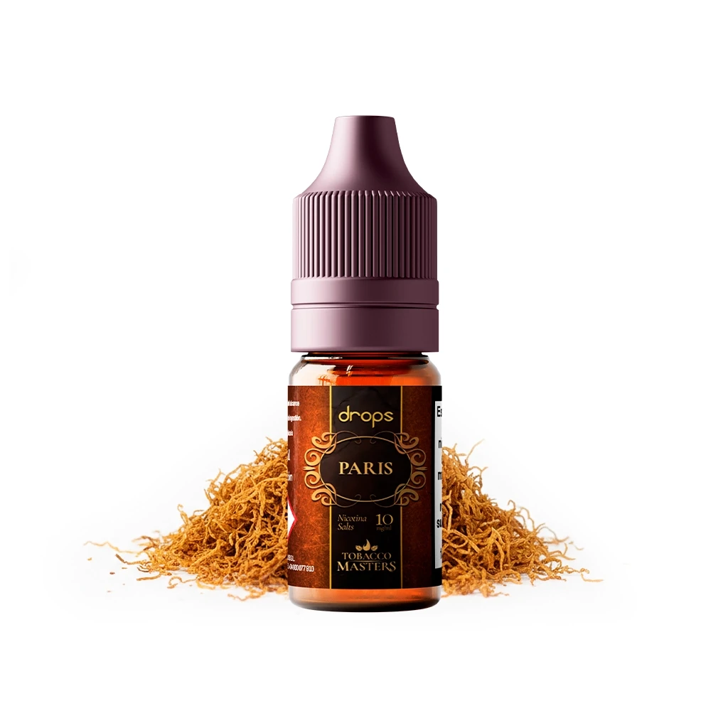 Frasco de Drops Tobacco Masters Salts Paris con tapón alargado morado y etiqueta negra y dorada, delante de tabaco desmenuzado.