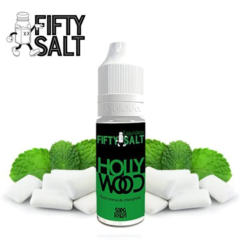 Frasco de e-líquido HOLLYWOOD Fifty Salt con tapón blanco y etiqueta verde y negra, rodeado de hojas verdes y chicles blancos.