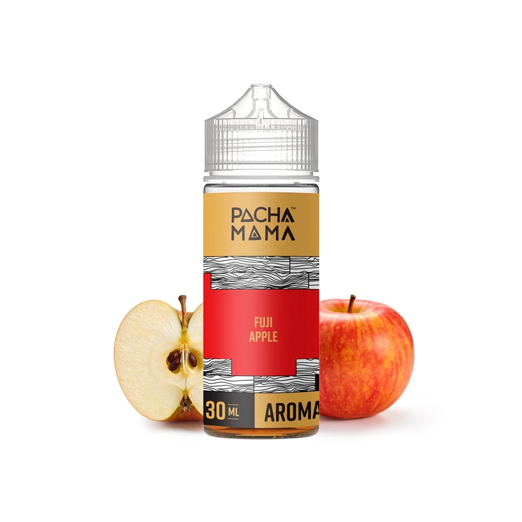 Frasco Pachamama Fuji Apple de 30 ml con tapón transparente y etiqueta roja y dorada, junto a una manzana roja y una mitad cortada.