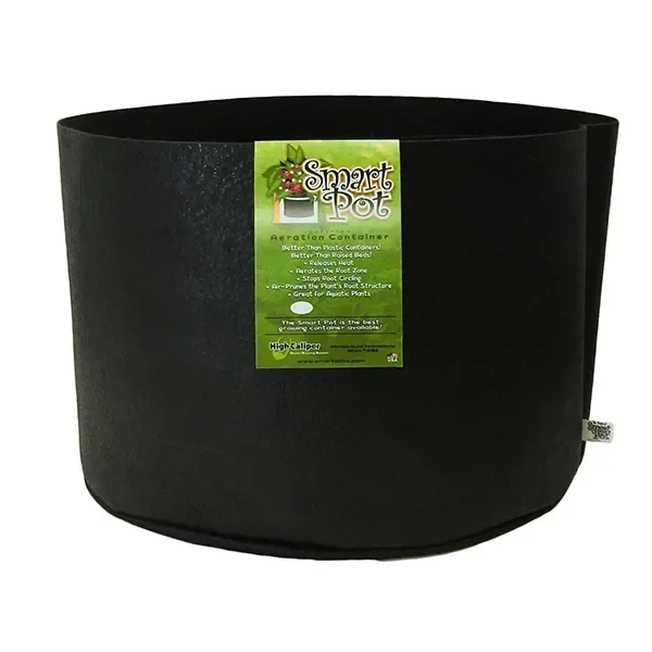 Maceta geotextil Smart Pot negra, de cuerpo ancho y flexible, con abertura circular y etiqueta verde en el frontal.