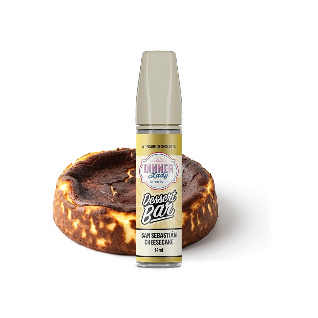 Frasco Dinner Lady Dessert Bar San Sebastián Cheesecake de 14 ml, con tapón beige, delante de una tarta de queso de superficie tostada.