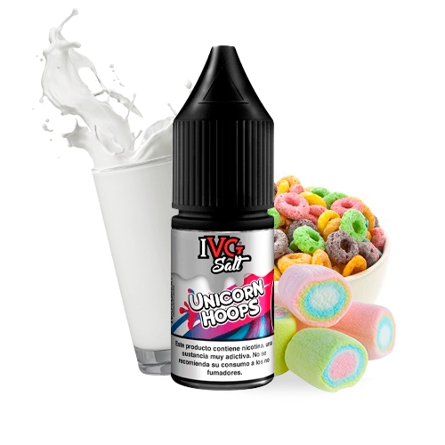 Frasco IVG Salt Unicorn Hoops con tapón negro, junto a un vaso de leche con salpicadura, cereales de colores y golosinas.