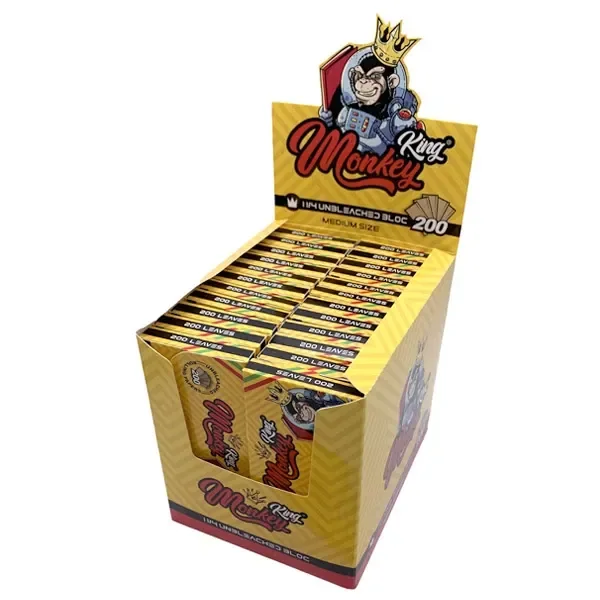 Expositor amarillo de papel Monkey King con varios libritos, un mono coronado en la cabecera y las indicaciones «1 1/4» y «200 leaves».