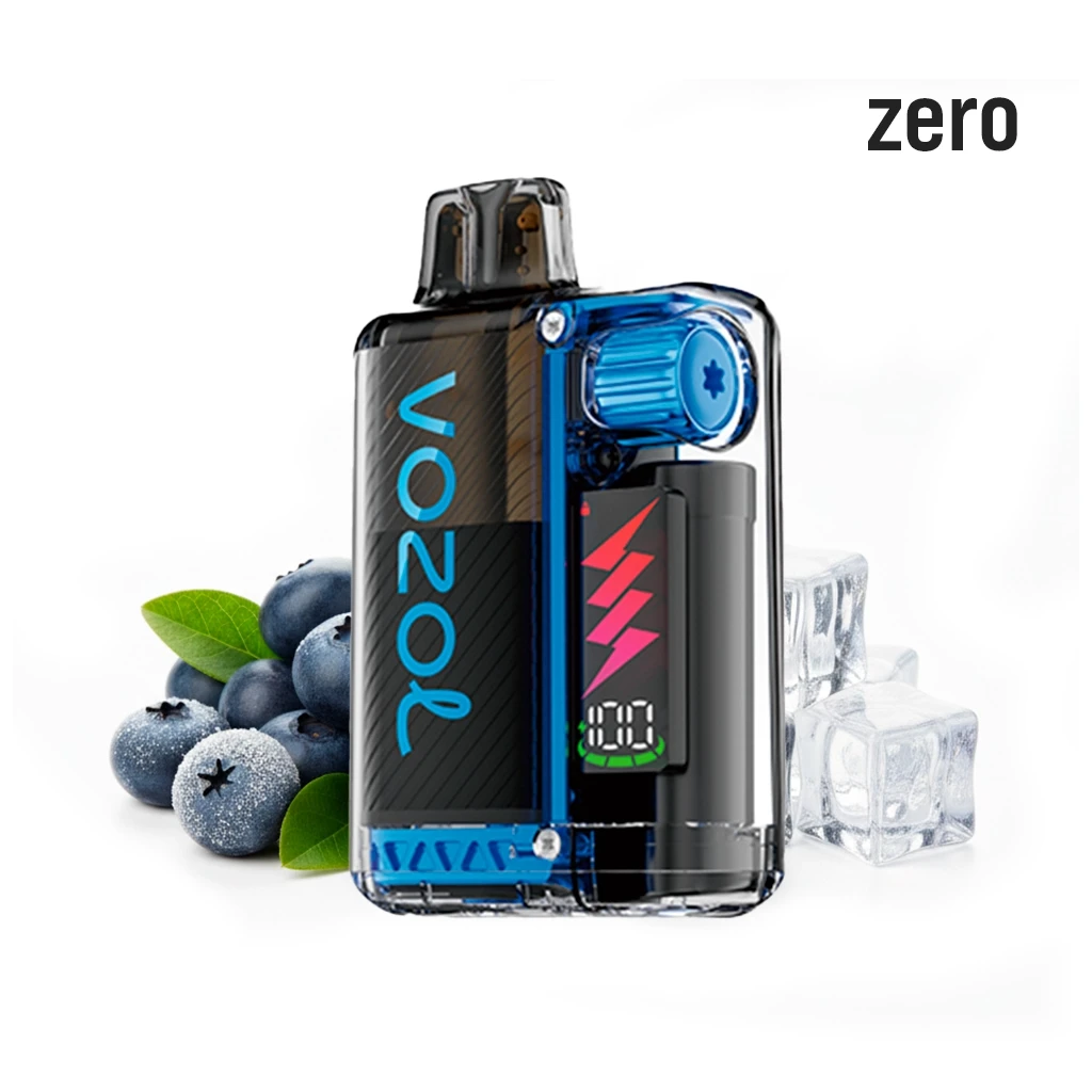 Vozol Vista Plug Blueberry Zero con carcasa transparente, detalles azules y pantalla frontal, junto a arándanos y cubitos de hielo.
