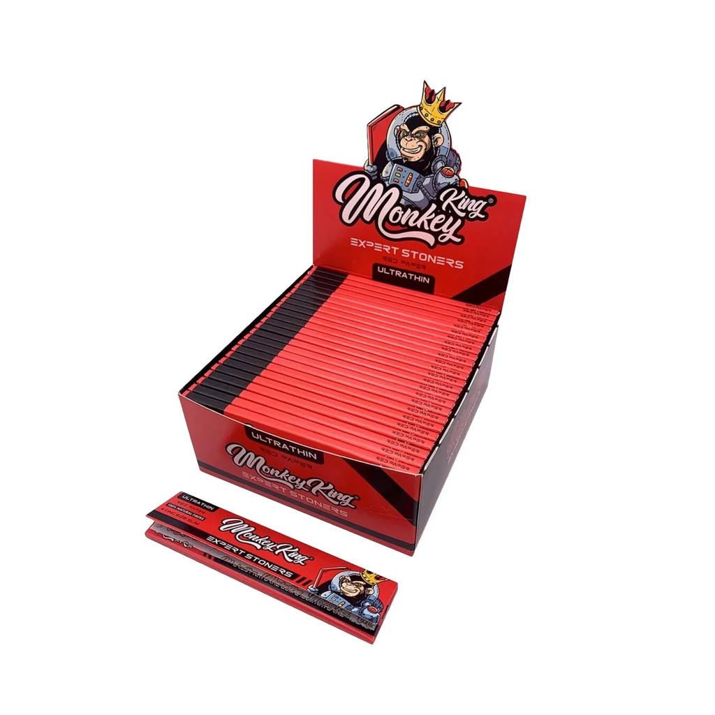 Expositor rojo de papel Monkey King Red KS Slim con varios librillos, uno delante, y un mono con corona en la cabecera.