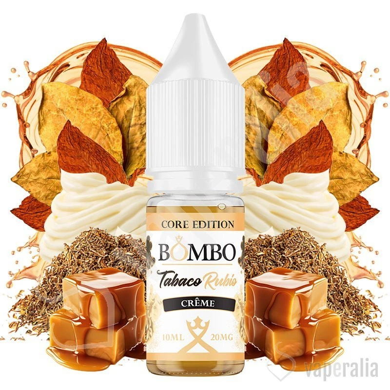 Frasco de Tabaco Rubio Crème Bombo Core Edition con tapón blanco, rodeado de hojas de tabaco, crema y dados de caramelo.