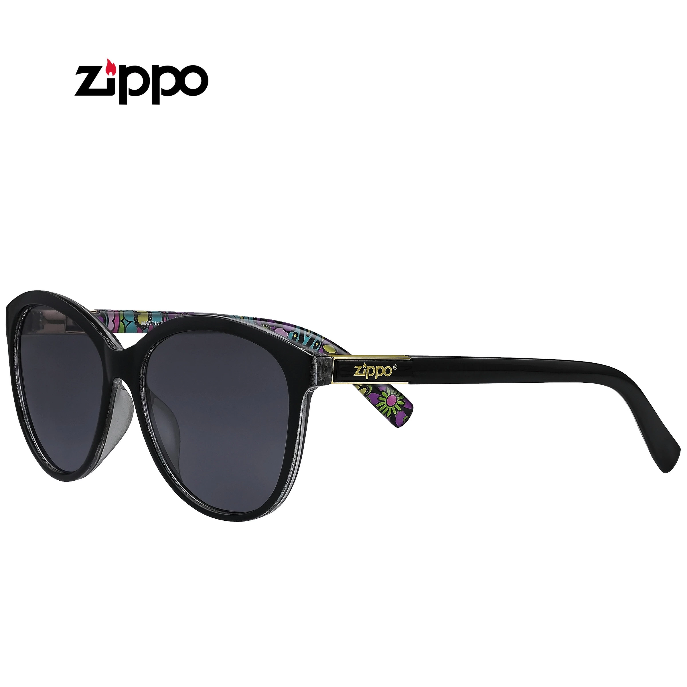 Gafas de sol OB228-3 Zippo con montura negra, lentes oscuras, logotipo dorado en la patilla y motivos florales multicolores en el interior.