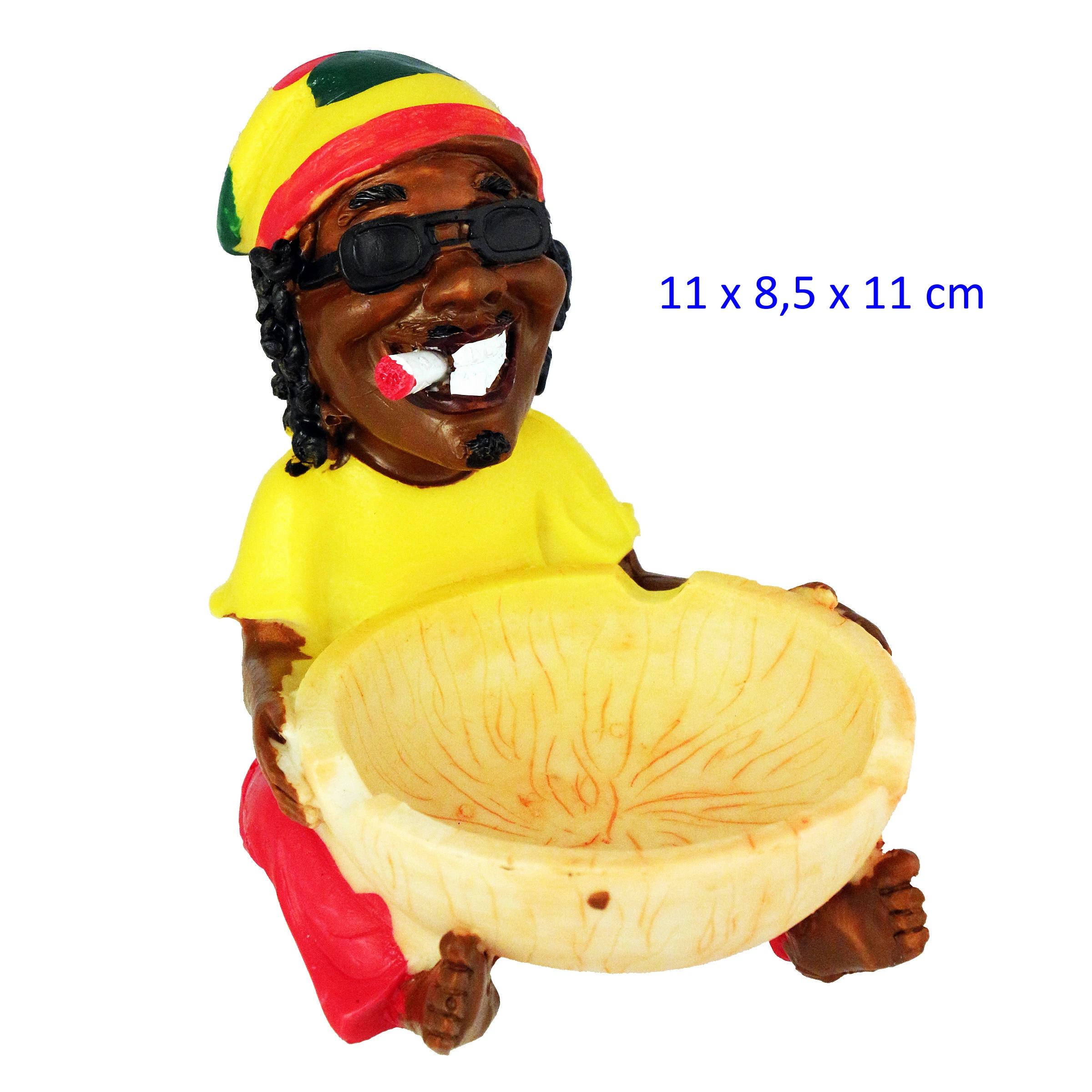Cenicero con figura sonriente de gafas negras, gorro rojo, amarillo y verde, camiseta amarilla y gran cuenco crema entre las piernas.