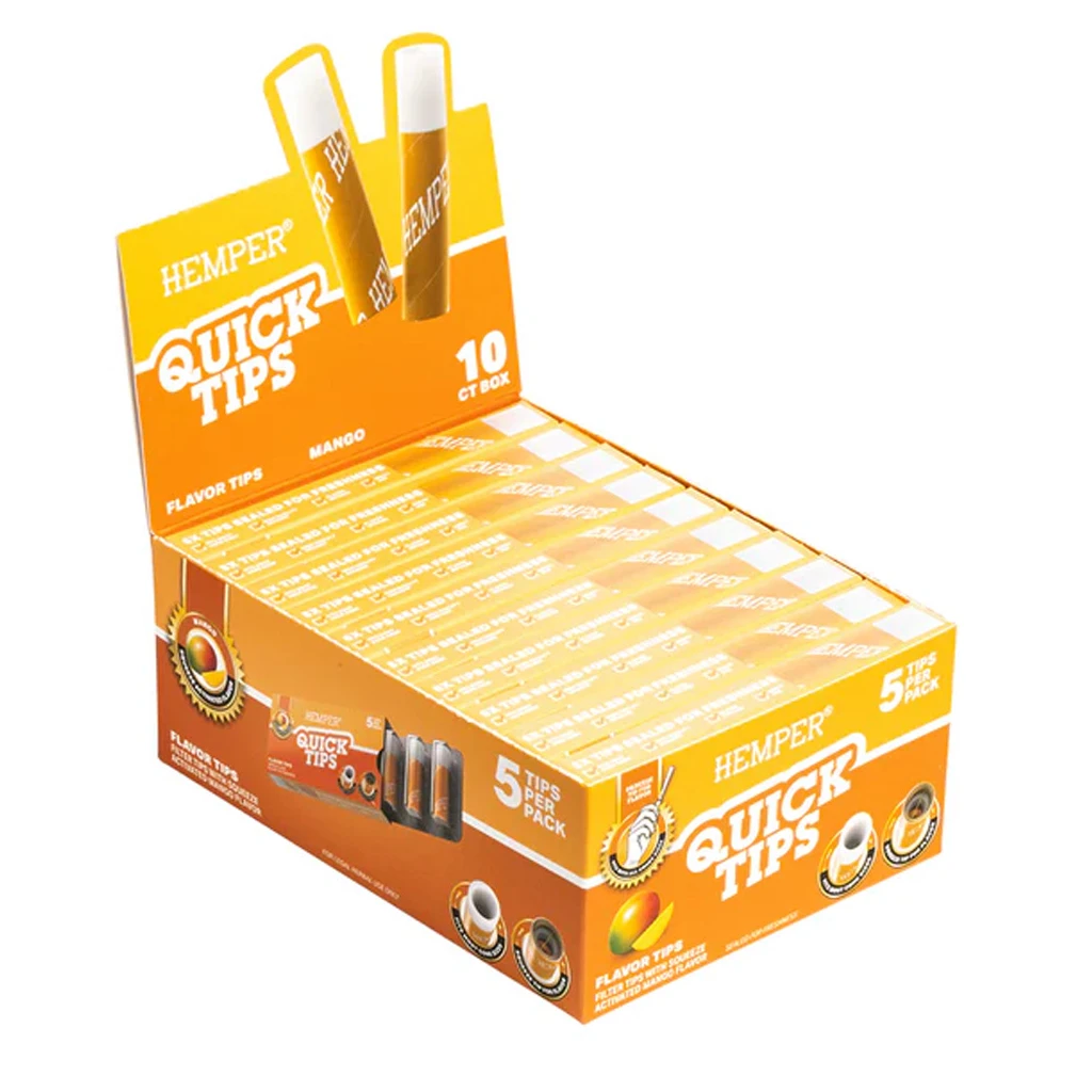 Expositor naranja de filtros Hemper Quick Tips Mango con varias cajitas y dibujos de boquillas; indica 5 filtros por paquete.
