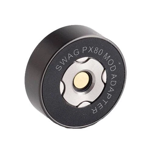 Adaptador Vaporesso Swag PX80 Mod 510 circular negro, visto en ángulo, con centro plateado y contacto dorado.