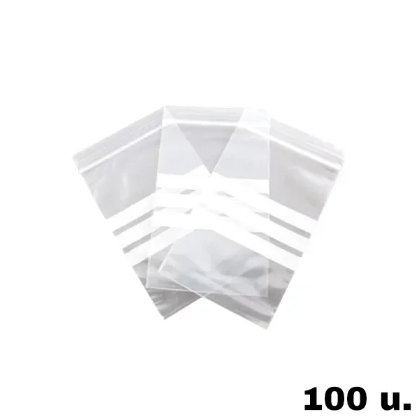Varias bolsas transparentes de autocierre superpuestas, con bandas blancas para escribir y el texto «100 u.» sobre fondo blanco.
