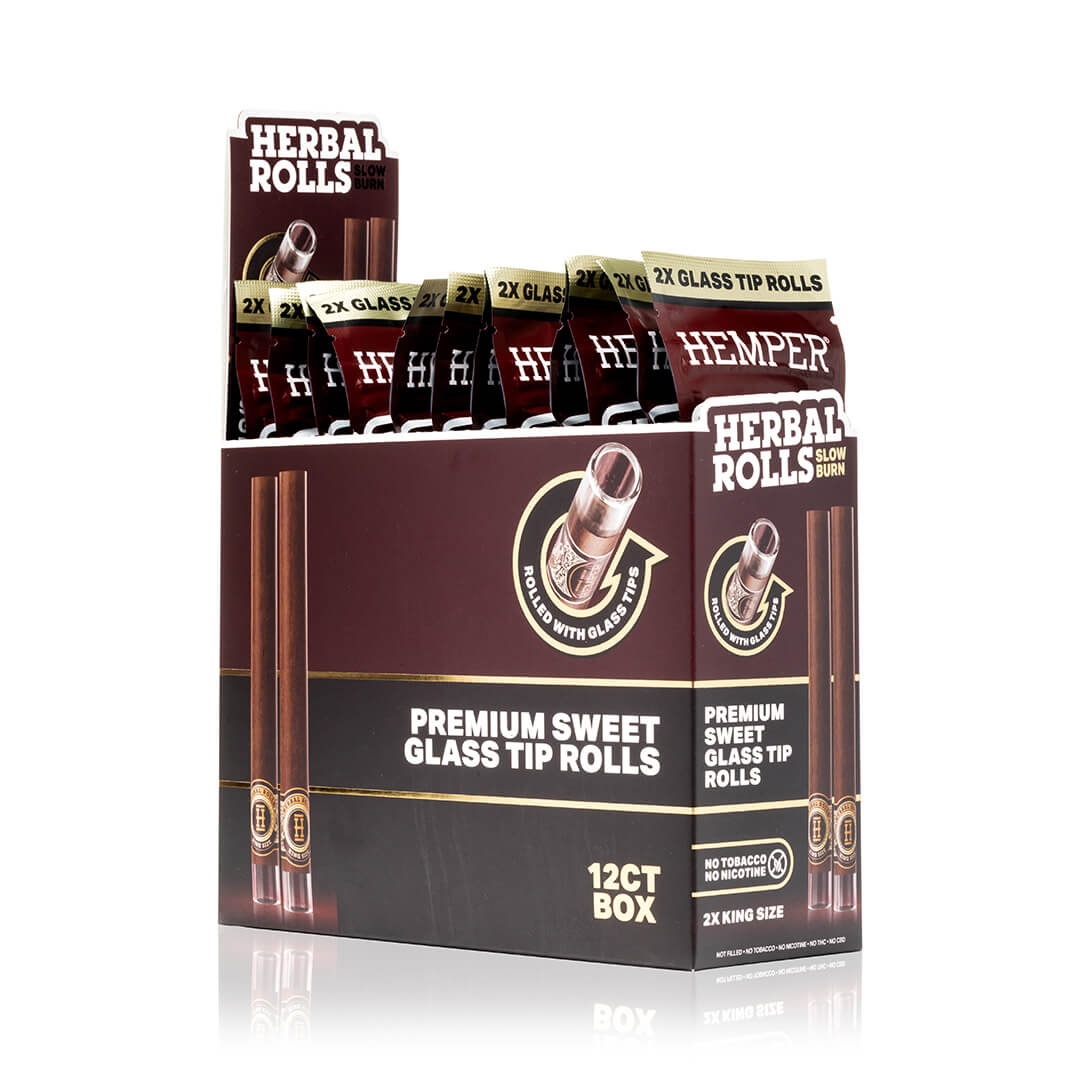 Expositor HEMPER Herbal Rolls Sweet con varios sobres King Size y dibujos de los rollos marrones con boquilla de vidrio.