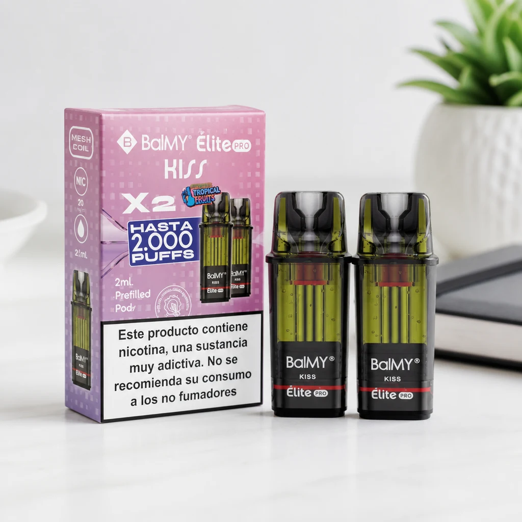Recambios Balmy Elite Pro Kiss con boquilla negra y depósito amarillo verdoso junto a su caja rosa, sobre una mesa blanca.