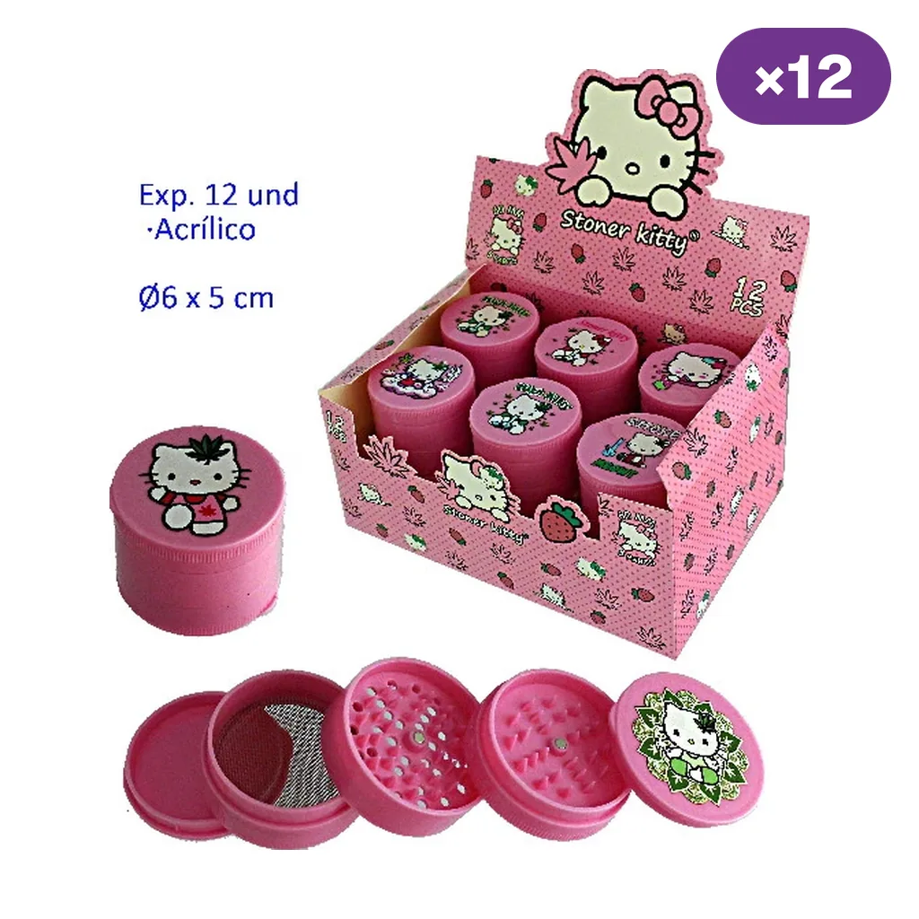 Expositor de grinders rosas Stoner Kitty con dibujos de gatos, junto a uno cerrado y otro desmontado que muestra dientes y malla.