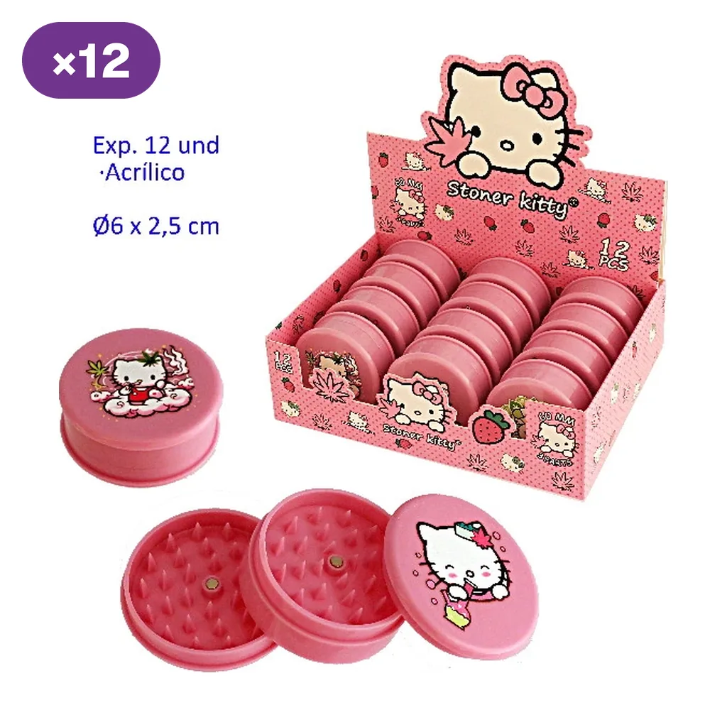 Grinders rosas Stoner Kitty con dibujos de gatitos, en expositor y fuera de él, con uno abierto que muestra los dientes interiores.