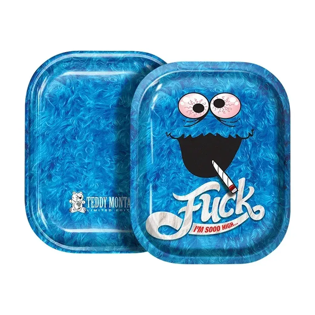 Bandeja H Monster mostrada por ambas caras, con estampado azul de pelo y un personaje de ojos rosados fumando en la cara frontal. Bandeja H Monster mostrada por ambas caras, con estampado azul de pelo y un personaje de ojos rosados fumando en la cara frontal.