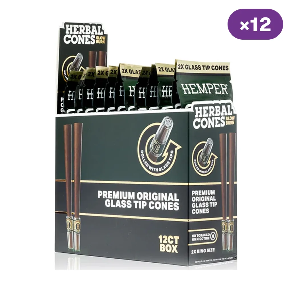 Caja expositora Hemper Herbal Cones con sobres de dos conos King Size con boquilla de vidrio y distintivo «×12» en la esquina superior.