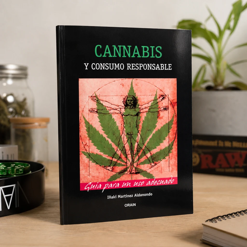 Libro «Cannabis y consumo responsable» sobre una mesa, con cubierta negra y una figura humana superpuesta a una hoja de cannabis. Libro «Cannabis y consumo responsable» sobre una mesa, con cubierta negra y una figura humana superpuesta a una hoja de cannabis.
