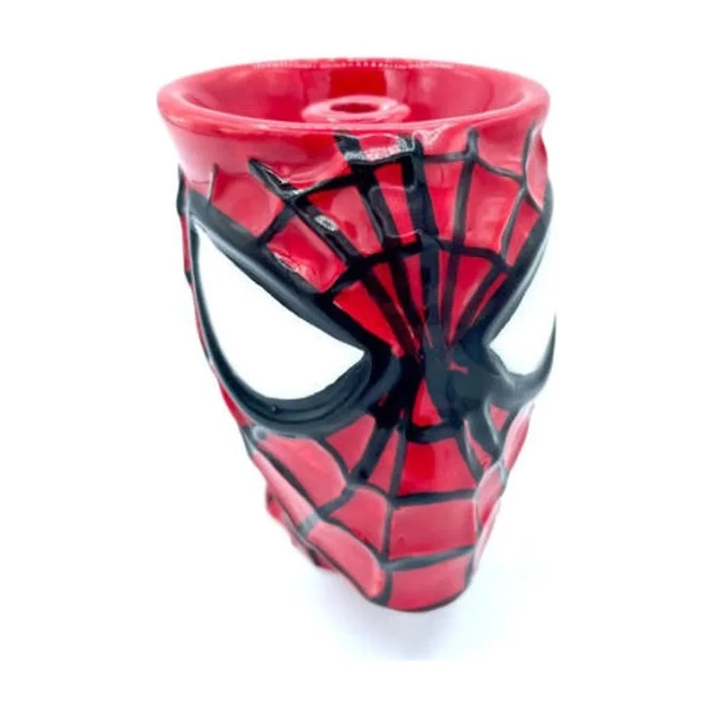 Cazoleta para cachimba con rostro de Spiderman, acabado rojo brillante, telarañas negras y ojos blancos; abertura superior visible. Cazoleta para cachimba con rostro de Spiderman, acabado rojo brillante, telarañas negras y ojos blancos; abertura superior visible.