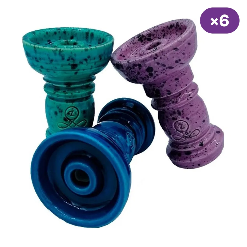 Cazoletas Özgür Z9 Phunnel en variantes turquesa, morada y azul, con acabado moteado y orificio central elevado; distintivo de seis unidades. Cazoletas Özgür Z9 Phunnel en variantes turquesa, morada y azul, con acabado moteado y orificio central elevado; distintivo de seis unidades.