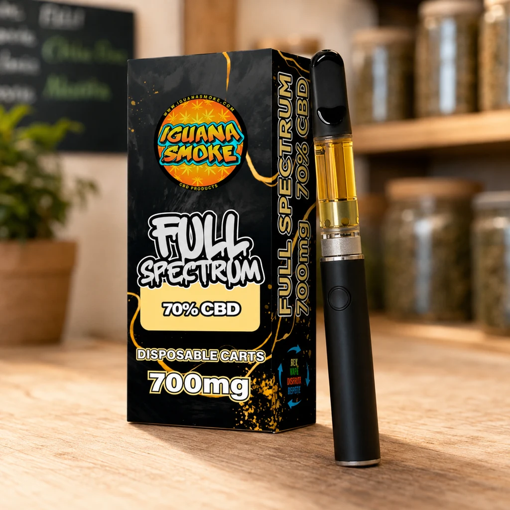 Escena generada de un dispositivo negro con depósito transparente y líquido dorado junto a una caja Iguana Smoke Full Spectrum 70% CBD.