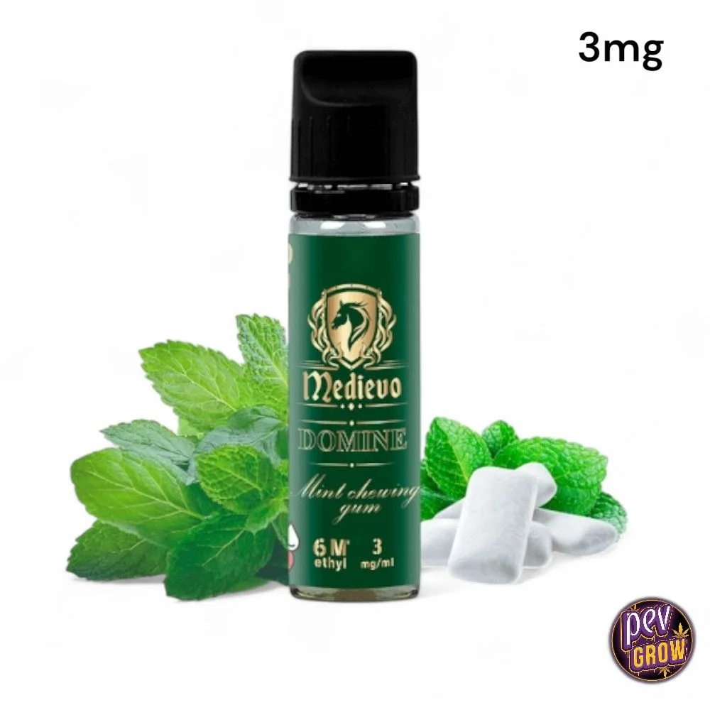 Frasco Medievo Domine con tapón negro y etiqueta verde, rodeado de hojas de menta y chicles blancos; texto «3mg» arriba.