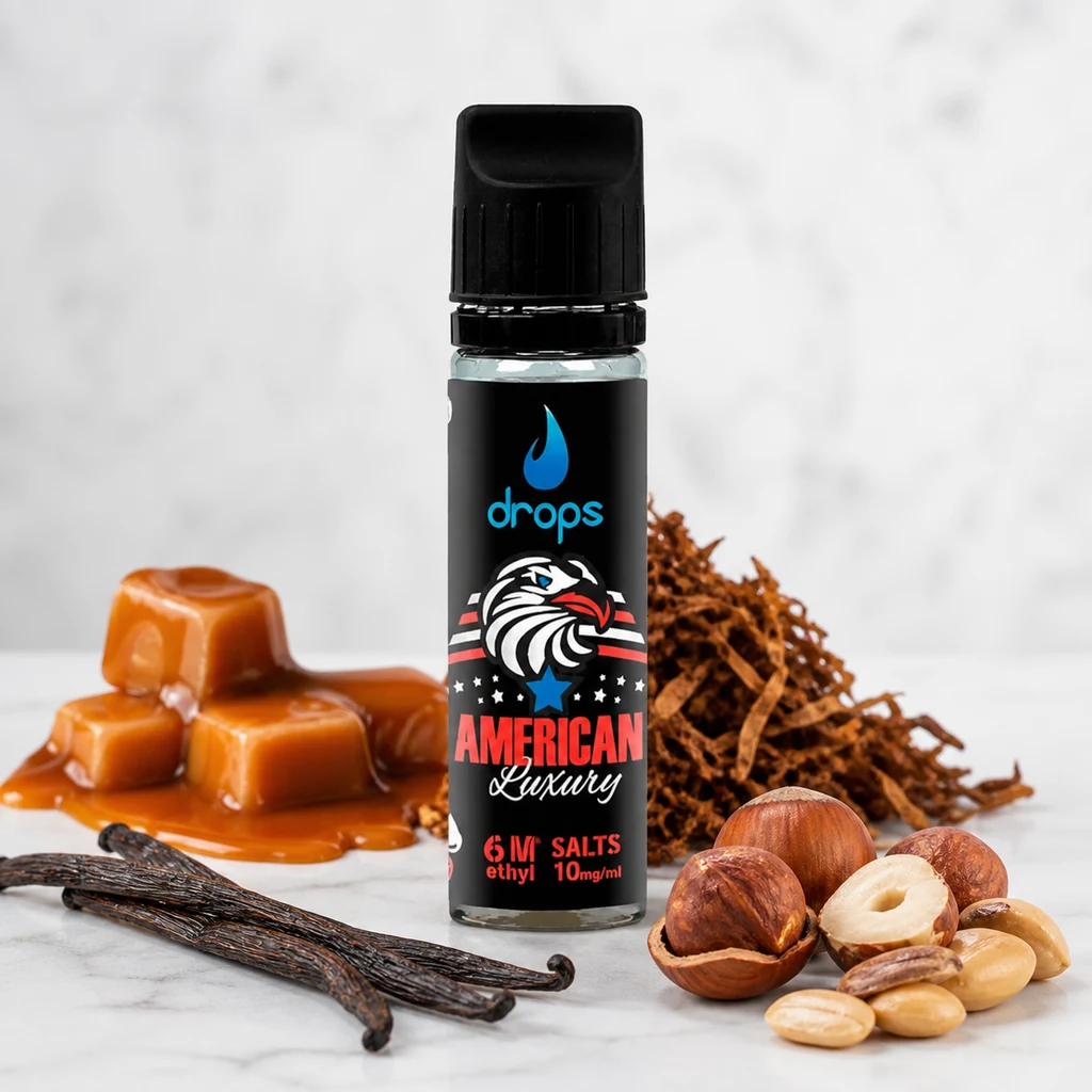 Frasco de Drops American Luxury con tapón negro y etiqueta con águila, rodeado de caramelos, vainas, frutos secos y hojas marrones.