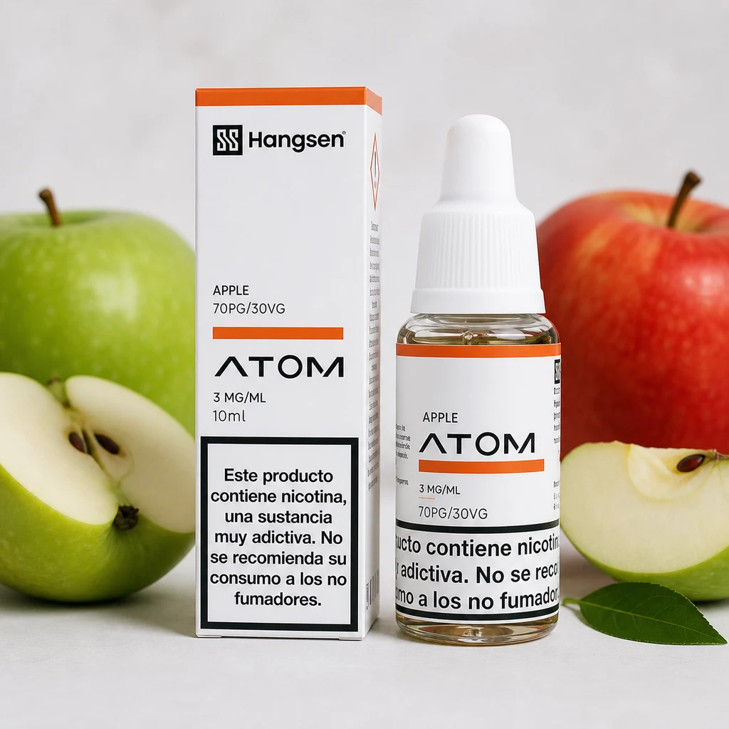 Frasco y caja Hangsen Atom Apple con etiquetas de 3 mg/ml y 70PG/30VG, rodeados de manzanas verdes y rojas, enteras y cortadas.