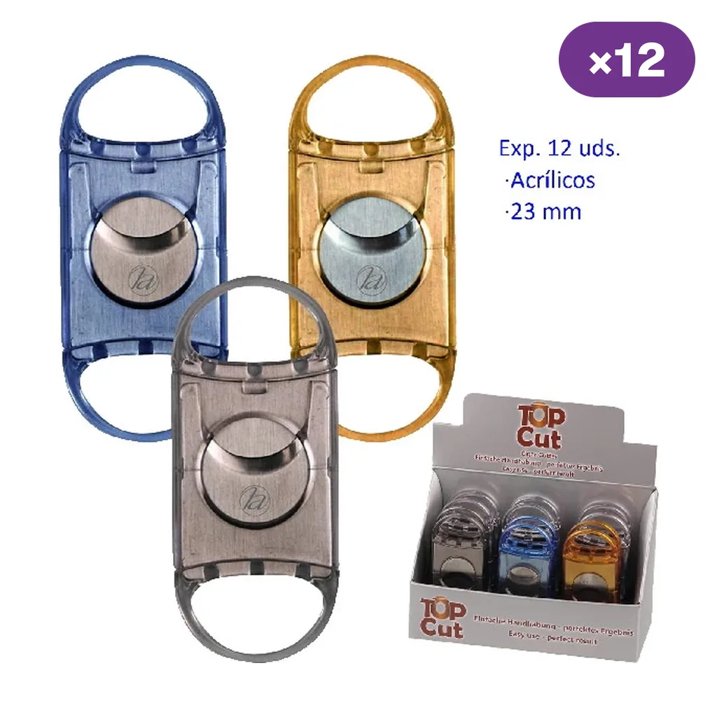 Cortapuros acrílicos de 23 mm en azul, ámbar y gris, con cuchillas circulares y asas ovaladas, junto a una caja expositora.