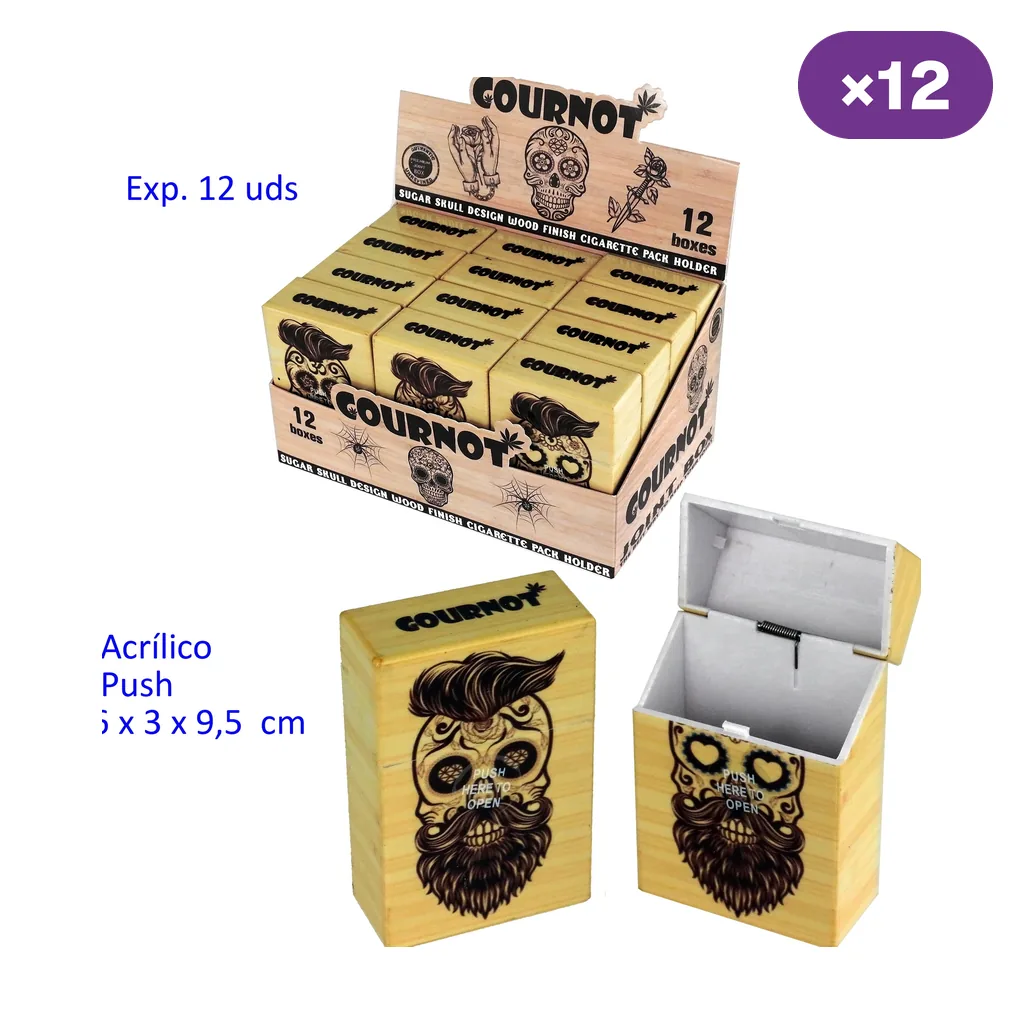 Tabaqueras Cournot con diseño de calavera barbuda y acabado visual de madera, una cerrada y otra abierta, junto a un expositor de 12 unidades.