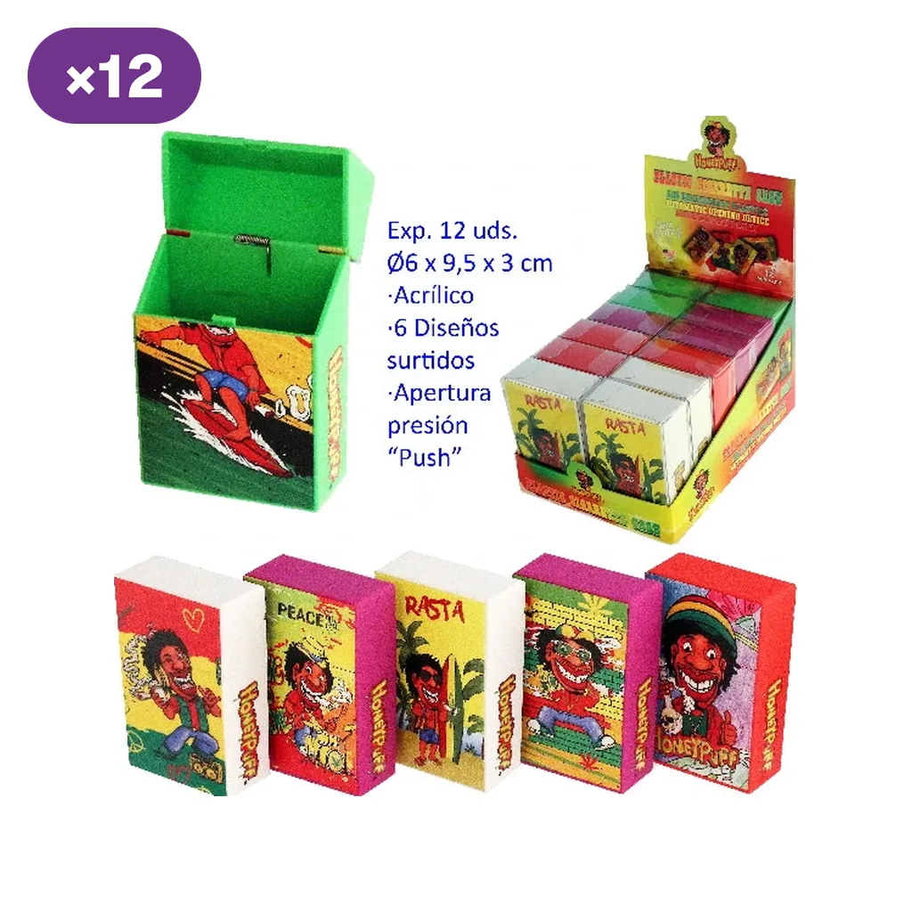Selección de tabaqueras acrílicas con distintos diseños rasta: una verde abierta, cinco cerradas y un expositor marcado con 12 unidades.