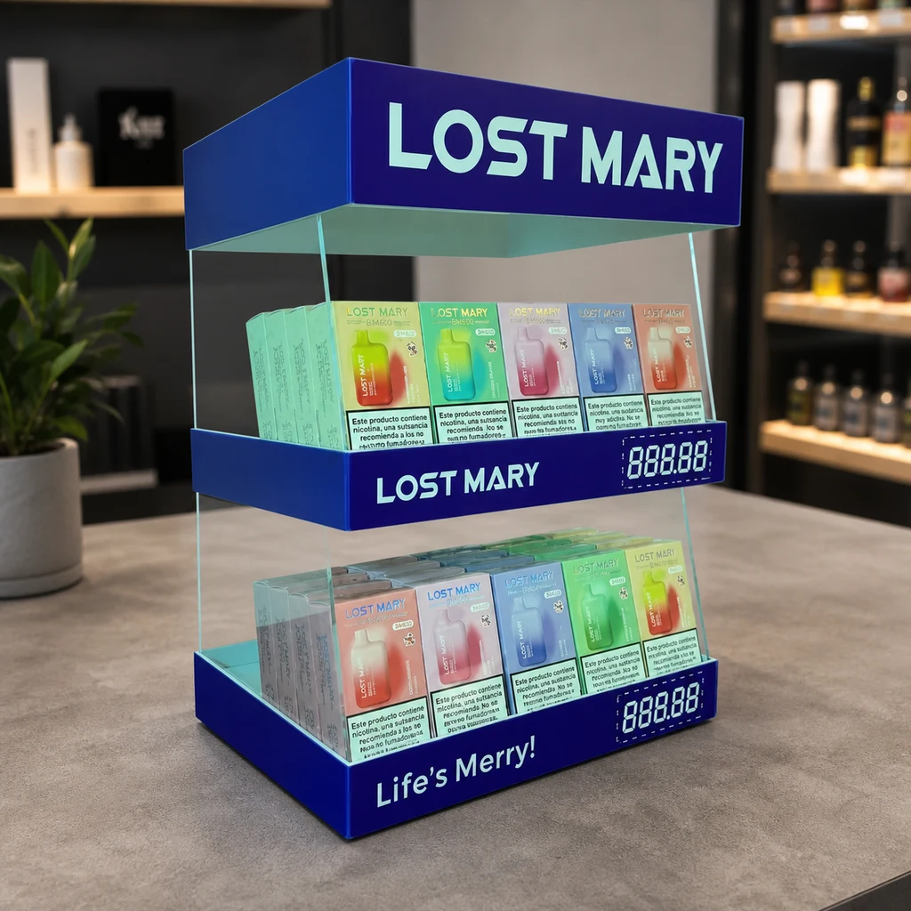 Expositor azul Lost Mary de dos niveles con cajas de distintos colores, paneles transparentes y visores numéricos sobre un mostrador.