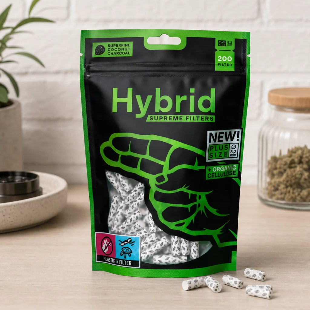 Bolsa negra y verde de filtros Hybrid Supreme Plus, con ventana que muestra filtros blancos moteados y varias unidades sobre la mesa.