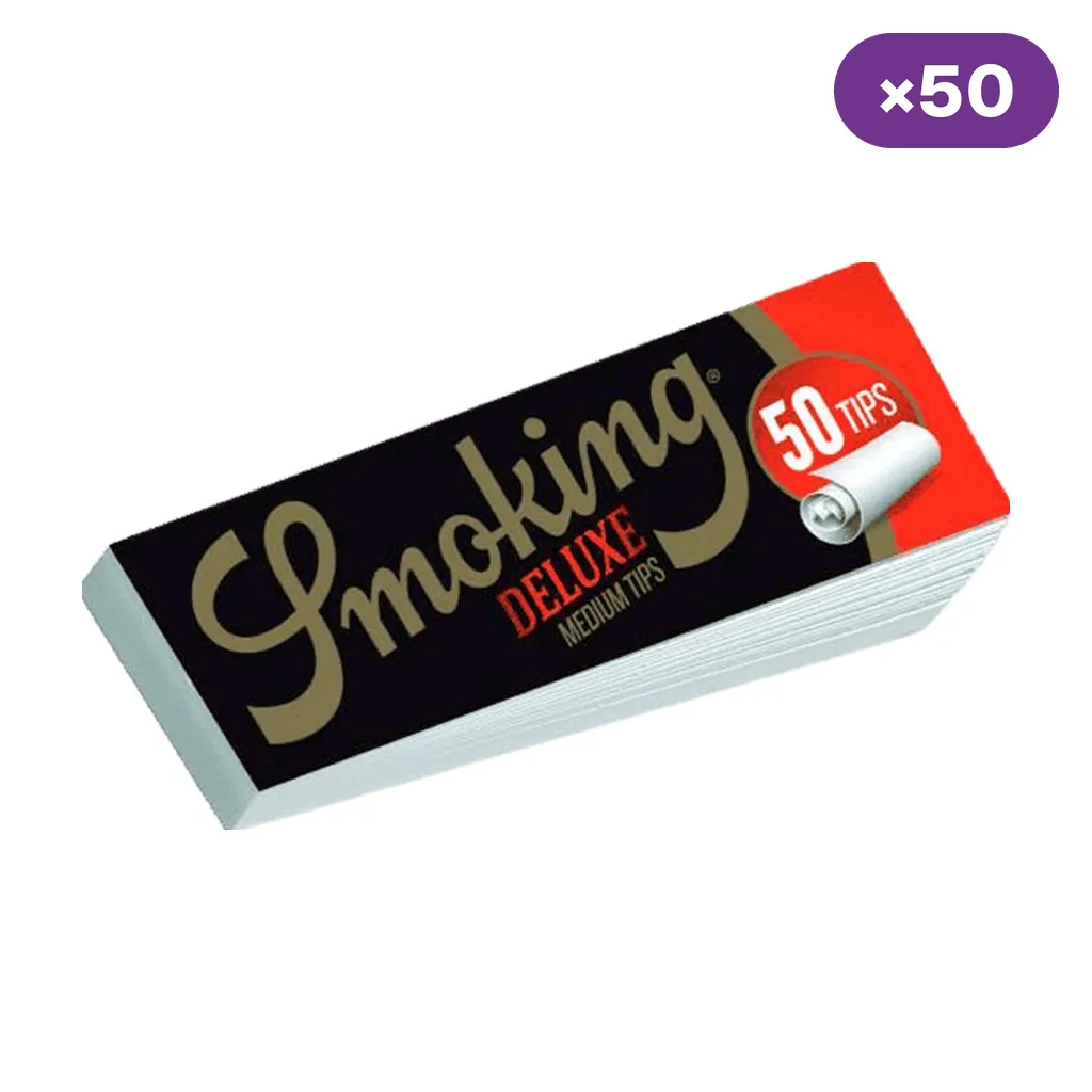 Librillo de filtros Smoking Deluxe Medium Tips, con cubierta negra y roja, texto «50 tips» e indicación de caja de 50 unidades.