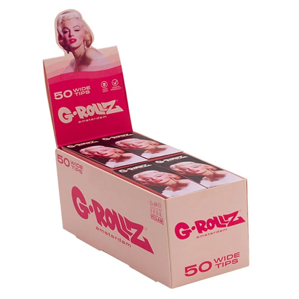 Expositor abierto de filtros G-Rollz Wide Marilyn, con libritos rosas, retratos de Marilyn Monroe y el texto «50 Wide Tips».