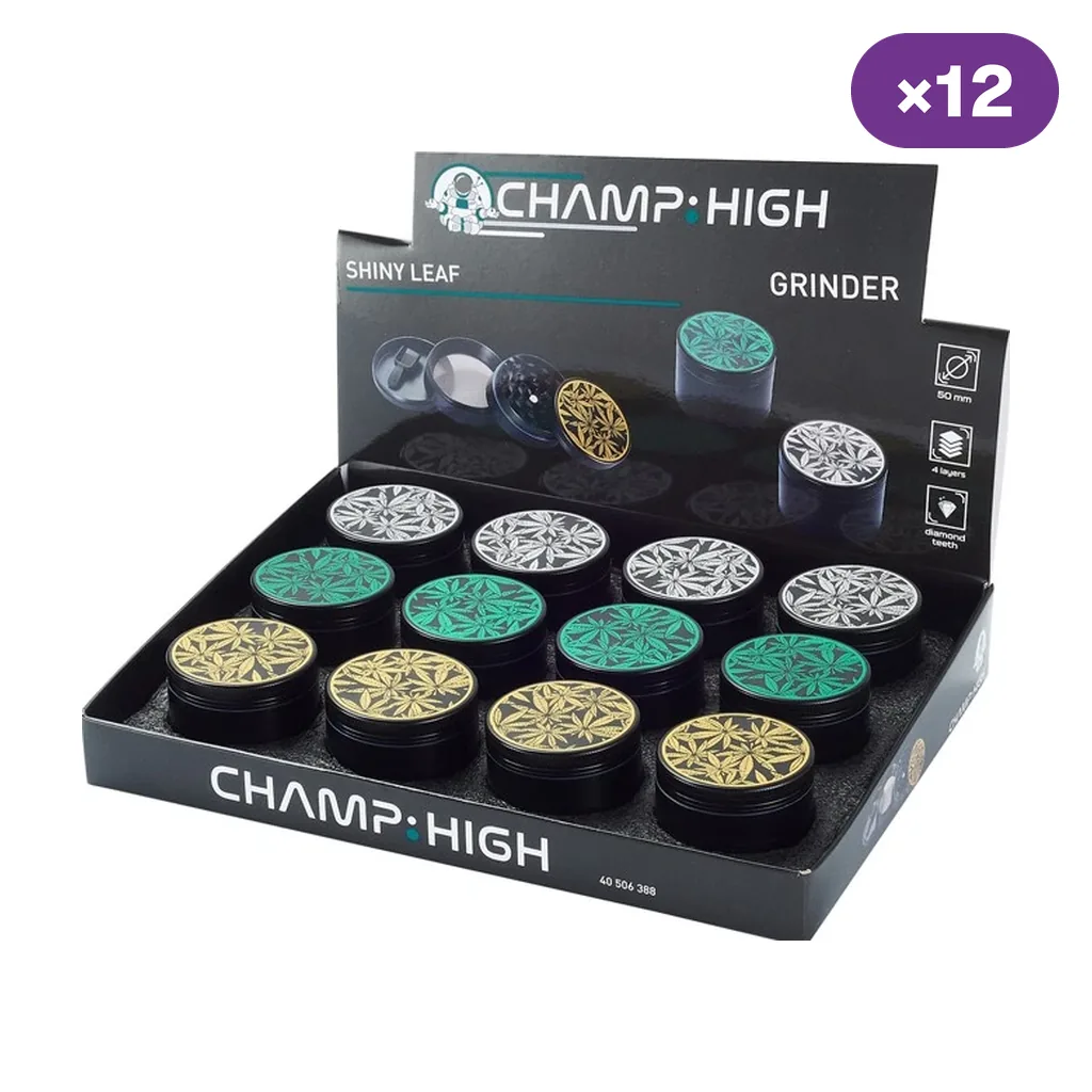 Expositor Champ High con varios grinders negros y tapas decoradas con hojas en verde, dorado y plateado; indica 50 mm y cuatro partes.