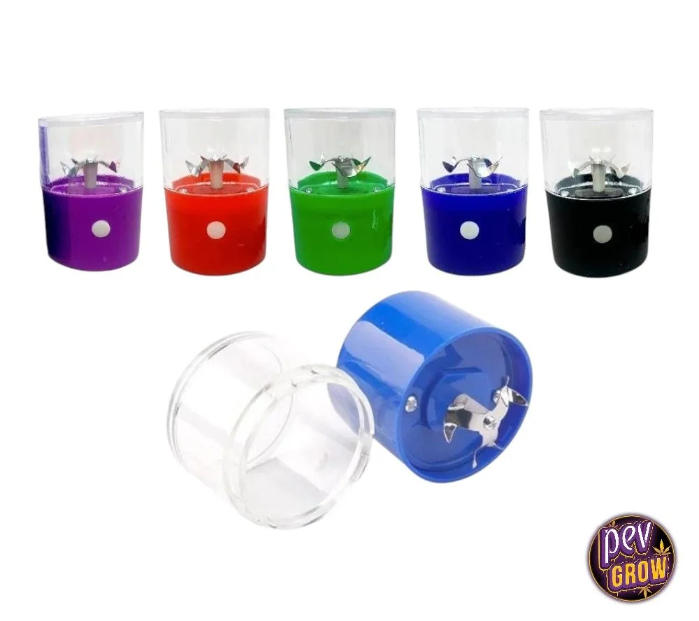Selección de grinders eléctricos en varios colores, con tapa transparente; modelo azul abierto en primer plano que muestra las cuchillas.