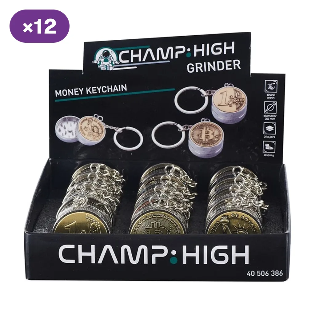 Expositor de grinders llavero Champ High Money con diseños de monedas, anillas plateadas y ejemplos abiertos en el cartel.