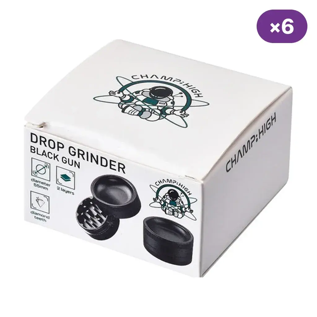 Caja blanca Champ High Black Gun Drop con dibujos del grinder negro abierto y cerrado, logotipo de astronauta y distintivo de 6 unidades.