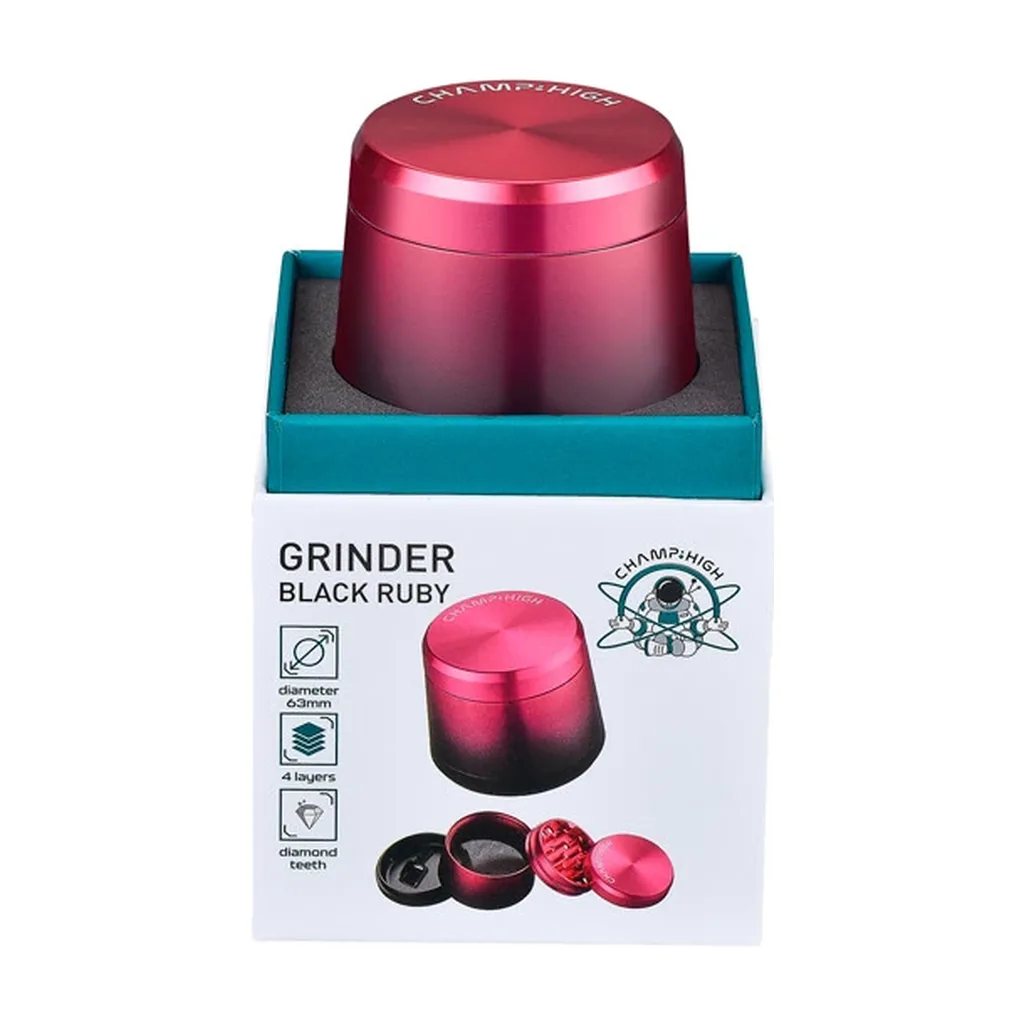 Grinder Champ High Black Ruby con acabado rojo degradado a negro, sobre su caja con ilustraciones de las piezas desmontadas.