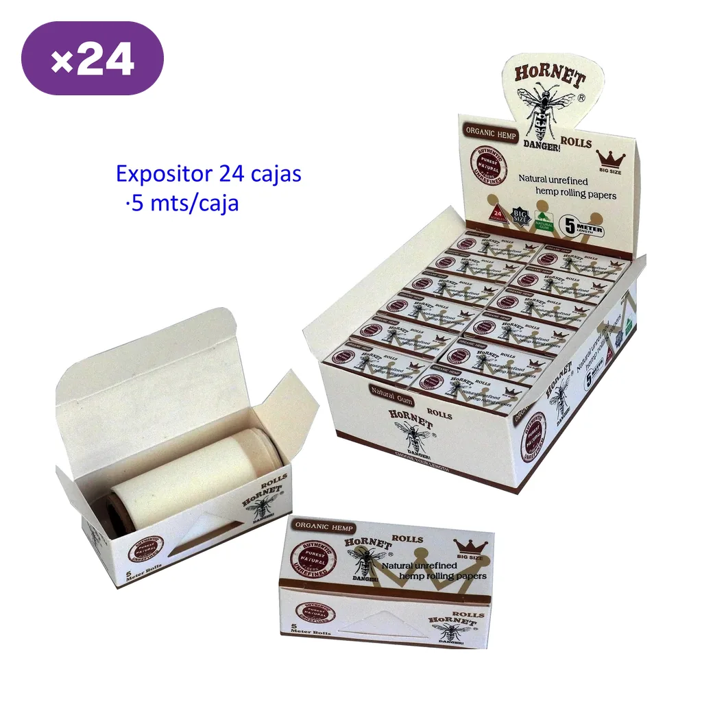 Expositor Hornet con cajas de rollos, una caja abierta mostrando el rollo claro y otra cerrada; los rótulos indican 24 cajas y 5 m por caja. Expositor Hornet con cajas de rollos, una caja abierta mostrando el rollo claro y otra cerrada; los rótulos indican 24 cajas y 5 m por caja.