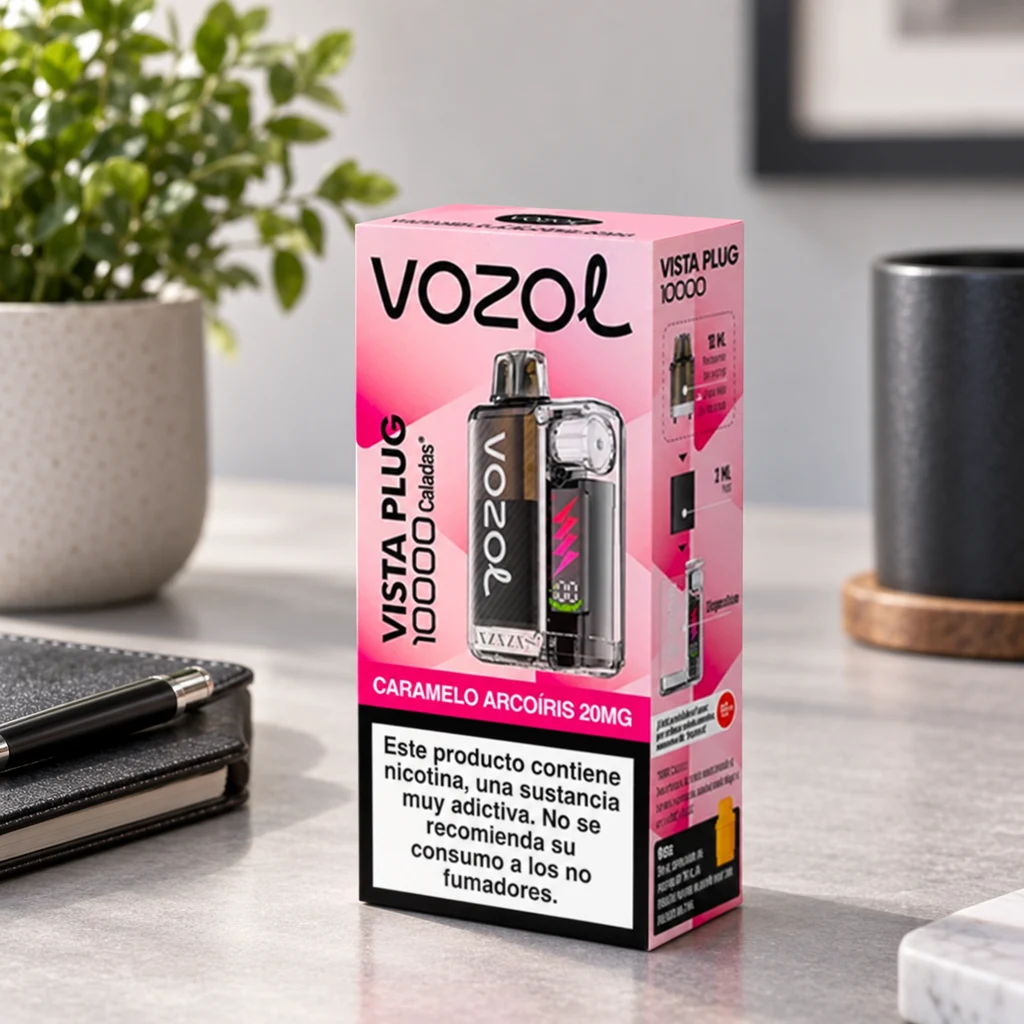 Caja rosa de Vozol Vista Plug sobre una mesa, con ilustración del vapeador, texto «Caramelo arcoíris 20mg» y advertencia sobre nicotina.