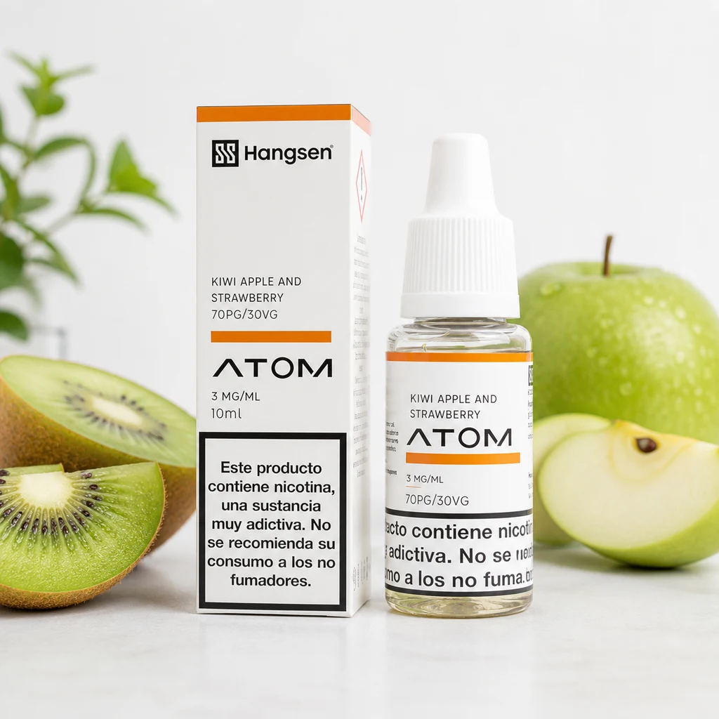 Frasco y caja Hangsen Atom junto a kiwi y manzana verde; etiqueta «Kiwi Apple and Strawberry», 3 mg/ml, 10 ml y 70PG/30VG.