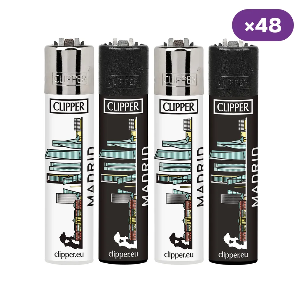 Cuatro encendedores Clipper Madrid Skyline en versiones blanca y negra, con ilustraciones de edificios y el nombre Madrid.