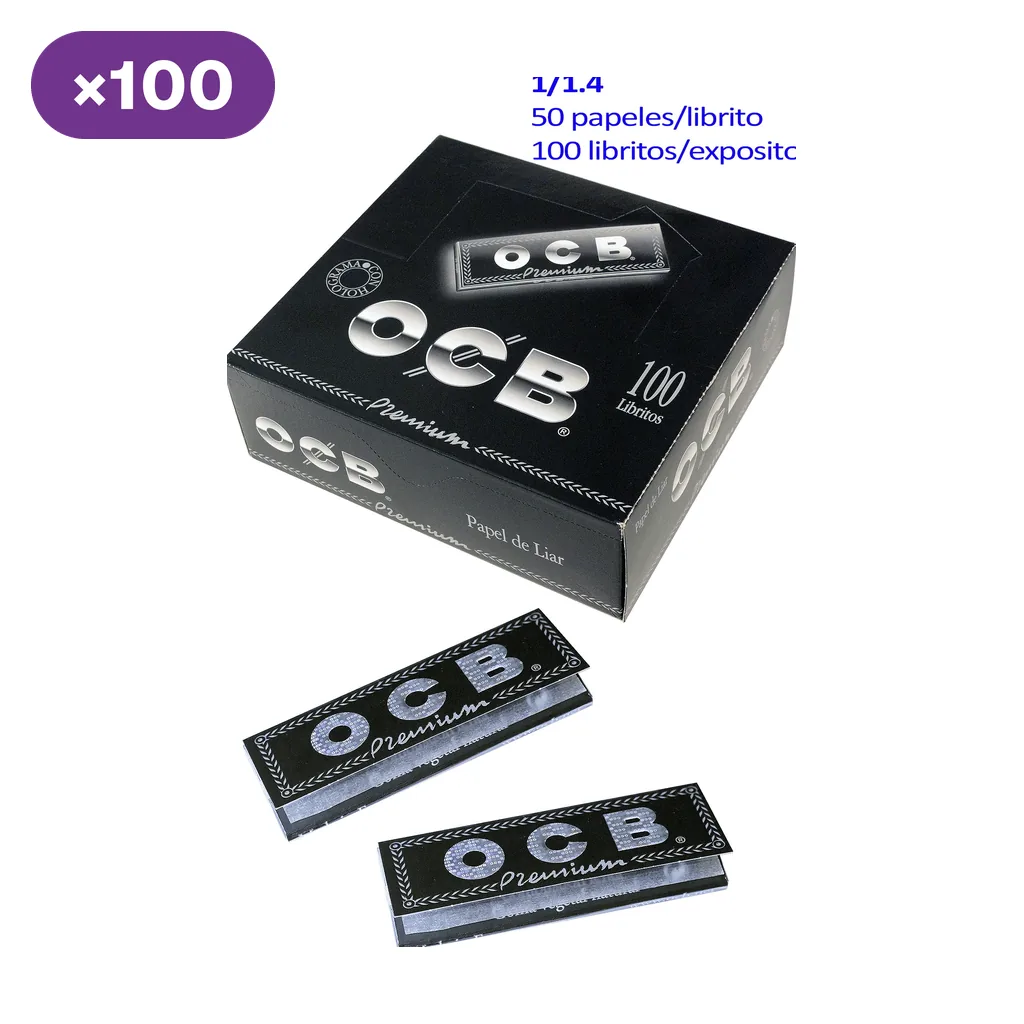 Caja negra de papel OCB Premium con libritos delante; el texto indica formato 1 1/4, 50 papeles por librito y 100 libritos por expositor.