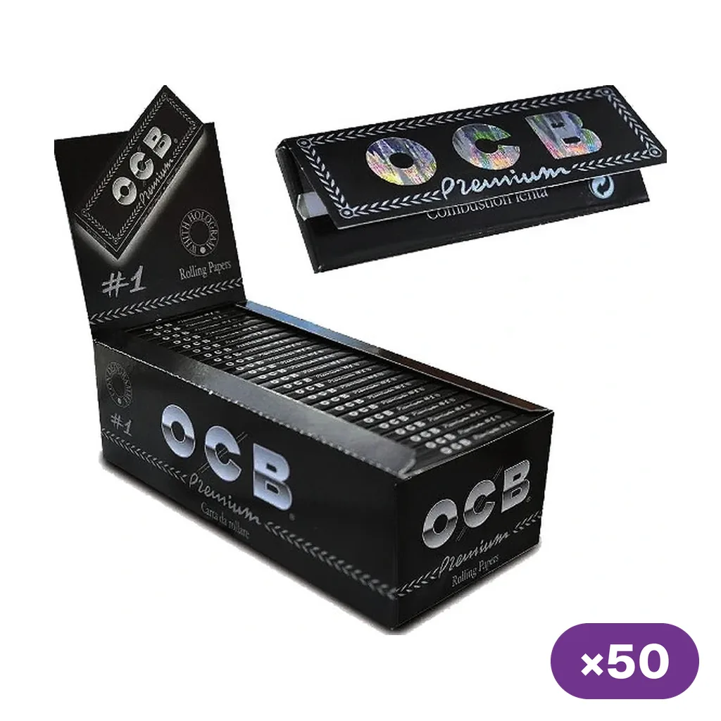 Caja expositora abierta de papel OCB Premium nº 1 con libritos negros, un librito ampliado arriba y distintivo de 50 unidades.