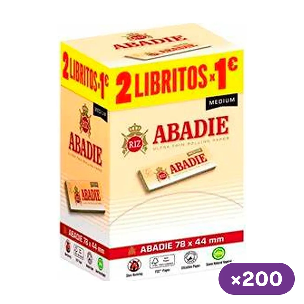 Caja de papel de liar Abadie Medium en tonos crema, amarillo y rojo, con dibujos de los libritos y un distintivo de 200 unidades.
