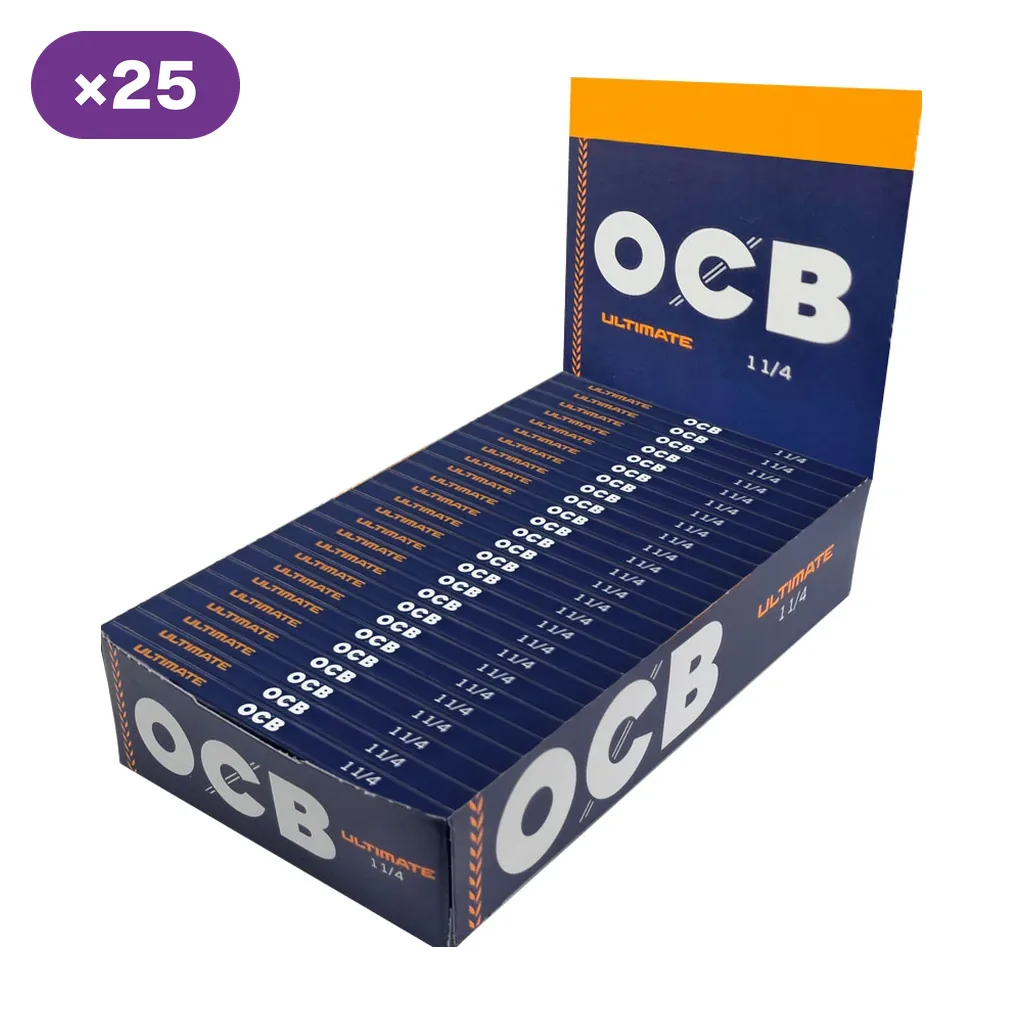 Caja expositora abierta con libritos azules de papel OCB Ultimate 1 1/4 y un indicador «×25» en la esquina superior izquierda.