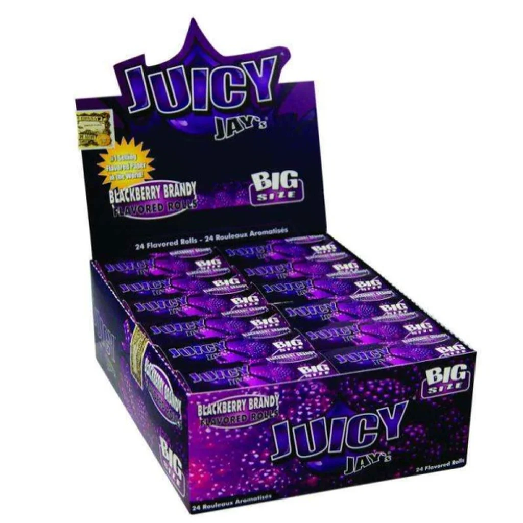 Caja expositora abierta de Juicy Jay's Rolls Blackberry Brandy, con envases morados, dibujos de moras y texto «Big Size».